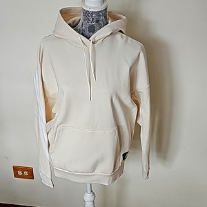Adidas women's oversaized  cream color sweatshirt.